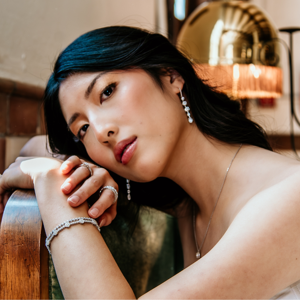 Tennis bracelet featuring round diamonds in a channel setting.